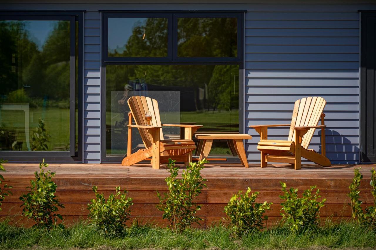 Parehua Resort Martinborough Exteriér fotografie A deck with A-frame chairs